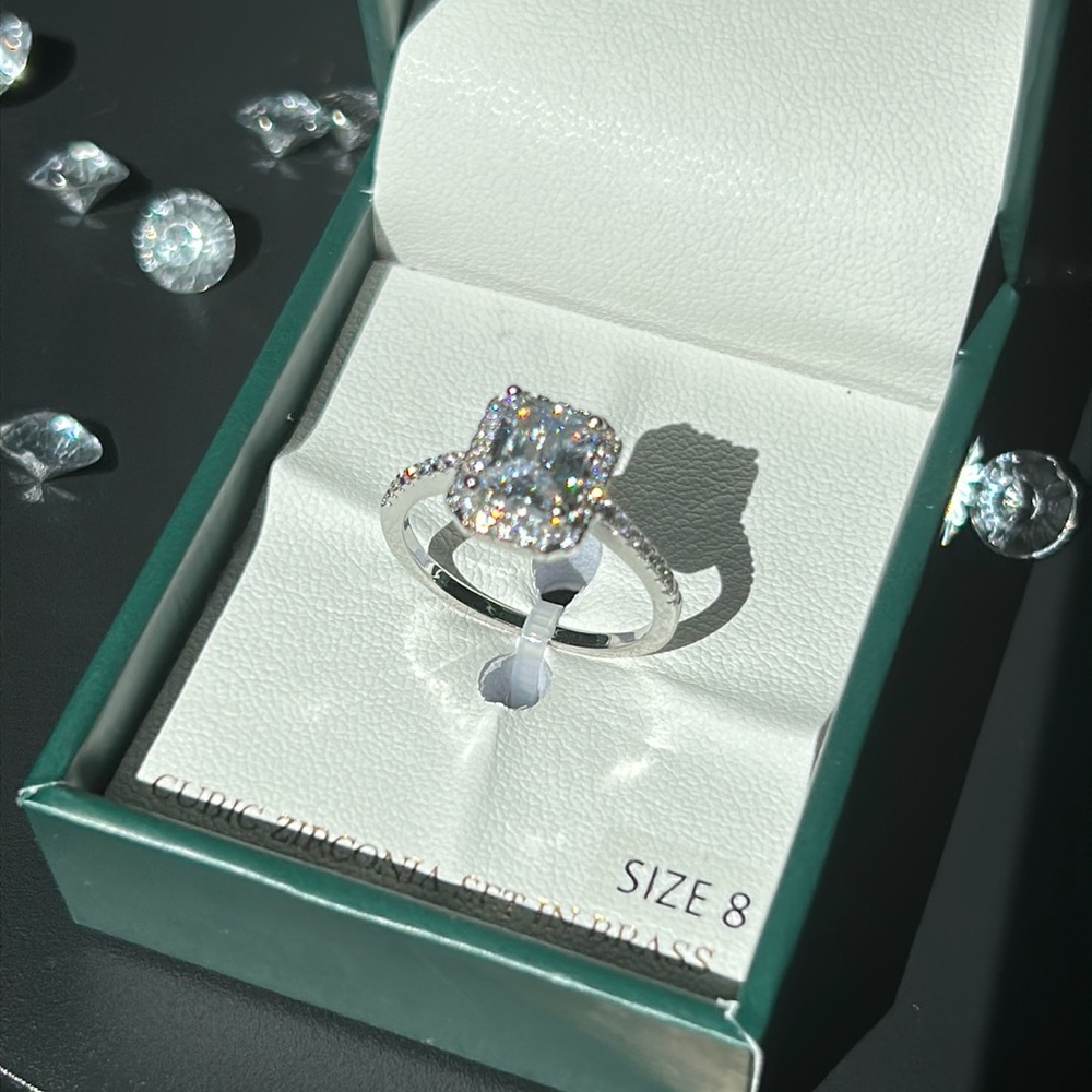 Jill New York size 8 silver tone ring. Cubic zirconia set in brass. NIB